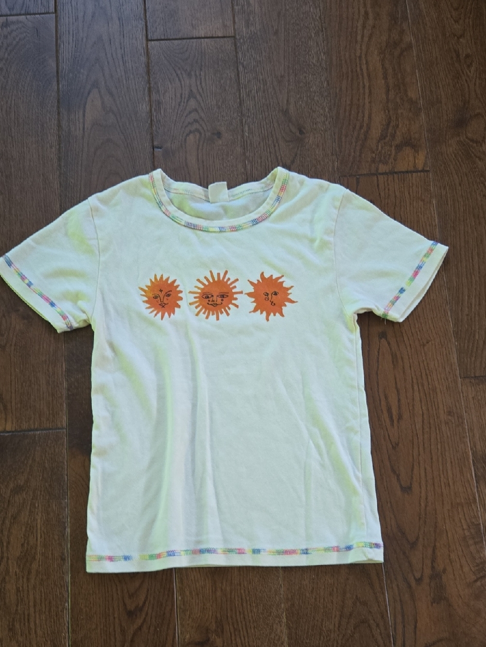 Urban Outfitters White Tee with Orange Sun Motif and Multicolor Trim